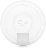 Wall mounted view of the enterprise grade UniFi 6 internet accessory demonstrating modern home office network deployment aesthetic