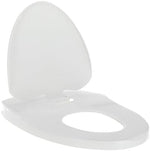 Nuby built-in potty training seat lowered down on an elongated white commode bowl for toddler use