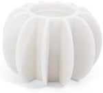 White reusable anti-winding clothes cleaning ball placed inside a washing machine drum