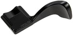 Black metal mirrorless camera accessory installed in universal hot shoe slot