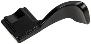 Black metal mirrorless camera accessory installed in universal hot shoe slot
