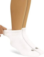 Four pair pack of imported women's non-binding socks for swollen feet.