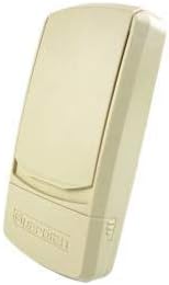 Guardian wireless garage door opener keypad with flip cover open showing the numeric button design