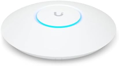 Ubiquiti UniFi 6 plus dual band network device mounted securely on a clean office ceiling surface