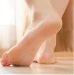 Close up of Ever Ready footcare tool removing corns from feet