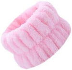 Two pairs of skincare wristbands for makeup routine display