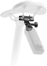 Action camera bicycle bracket mounted underneath a bike seat rail capturing a rear perspective.