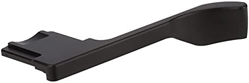 Ergonomic black metal hand grip showing precision CNC machining contours.