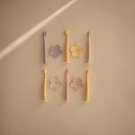 Close up of soft silicone bristles on Mushie toddler toothbrush