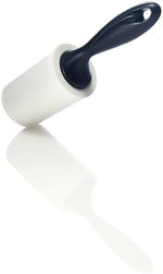 Close up of 3M mini lint roller adhesive sheets showing clean tear edges.