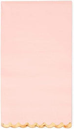 Sparkle and Bash party napkins folded set on a dining table