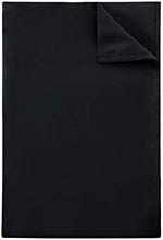 Elegant bedroom decor setup showcasing the sleek black Sfoothome queen size top sheet folded neatly over standard pillows.