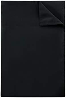 Elegant bedroom decor setup showcasing the sleek black Sfoothome queen size top sheet folded neatly over standard pillows.