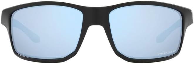 Oakley sunglasses resting on a clean surface showing lens curvature.