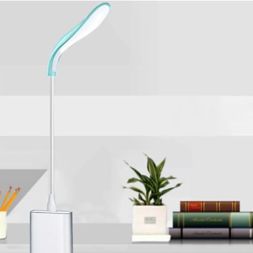 Generic portable book night light plugged into a laptop keyboard port illuminating keys