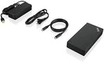 Lenovo multi-port workspace hub connected via single universal cable to a premium notebook.