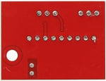 Rear solder side of the thirty-three by twenty-five millimeter miniature audio preamplifier circuit board
