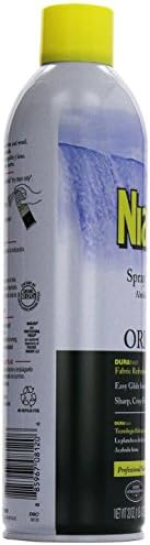 Faultless Niagara starch spray being used on a cotton shirt for a wrinkle-free look