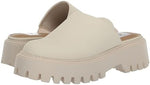 Angled view of Dolce Vita Lexy lug sole mule in ivory