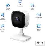Smart indoor surveillance camera placed on a shelf monitoring a baby crib.