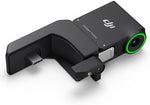DJI RS smart tracking accessory displaying the magnetic quick release lock system on the bottom base.