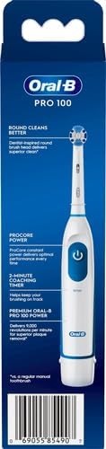 Close-up of the precision clean round brush head on the Oral-B Pro 100 electric toothbrush.
