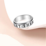 Authentic OreilleStar size 7 silver engraved mantra ring showing the detailed finish and craftsmanship.