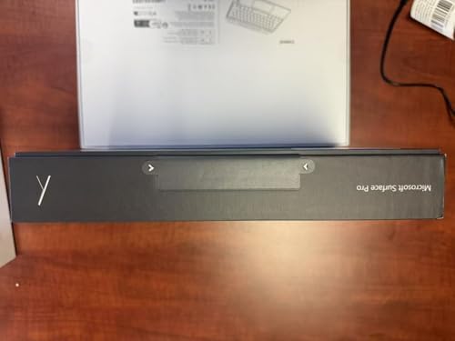 Microsoft Surface Pro 11 back panel in matte black finish showing the reflective Microsoft logo