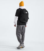 The North Face Recon travel rucksack front angle view displaying the daisy-chain attachment points and iconic embroidered logo