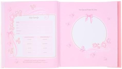 Infant girl memory scrapbook close up showing the detailed floral and butterfly cover motifs