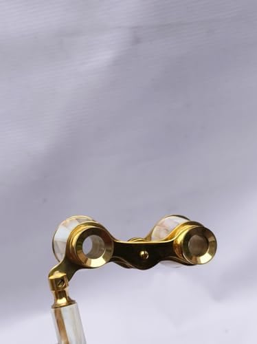 Generic brass opera glasses held by a user highlighting the elegant grip and lightweight structure for couples theater gifting.