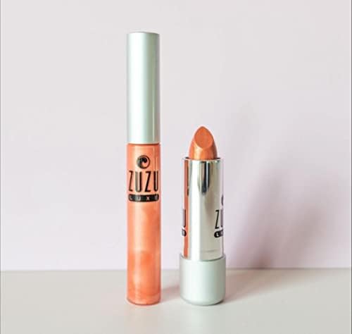 Zuzu Luxe sheer gloss swatch on skin showing shimmer finish