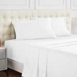 Close up view of the 600 thread count pure cotton stitching on the luxury white flat bed sheet.