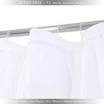 Full length view of the elegant non see through white cloth curtain draped beside a vintage clawfoot tub.