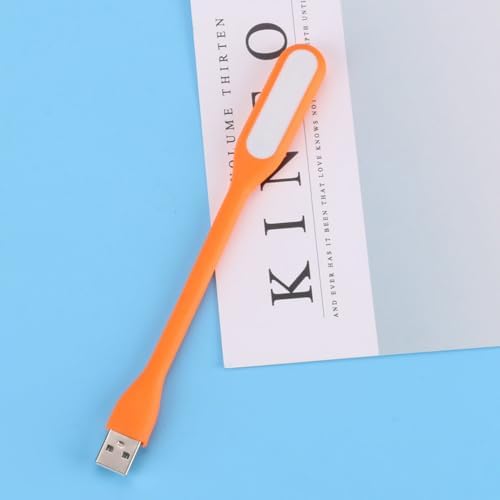 Generic small USB emergency light illuminating a dark room via power bank connection