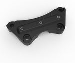 Satin black one piece motorcycle upper handlebar clamp showing four hole mounting layout