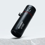 Side profile of the compact waterproof handheld monocular displaying the textured non-slip rubber armor coating.