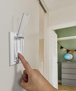 Transparent light switch guard preventing accidental toggling