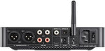 FiiO K13 premium black audiophile desktop DAC system sitting next to high end headphones