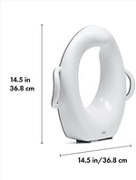OXO Tot toddler toilet seat in gray highlighting the stable non slip bottom edge
