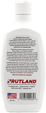 Close up of Rutland wood stove glass cleaner bottle showing silicone layering formula and micro-scrubbers.