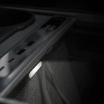 Vion Tesla charging hub showing ambient light feature at night
