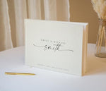 Modern Album Designs premium guest book displayed on a reception table