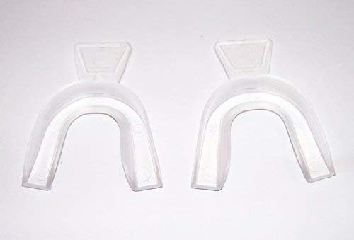 Ten three cubic centimeter whitening gel syringes with customizable thermoplastic mouth trays and shade guide