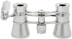 Levenhuk Broadway 325E elegant lorgnette binoculars placed next to a luxury evening purse
