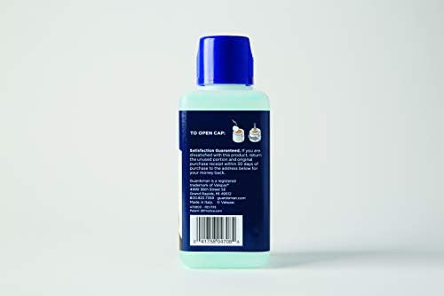 Guardsman leather cleaner being applied to a brown leather sofa for dirt removal.