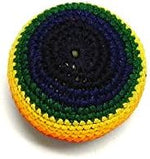 Handcrafted Guatemalan footbag kick sack in vibrant rainbow stripes for outdoor games.