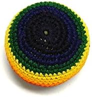 Handcrafted Guatemalan footbag kick sack in vibrant rainbow stripes for outdoor games.