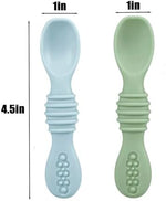 Toddler using PandaEar stainless steel spoon and suction plate