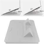 HoYiXi silver faux leather pouch being used as a functional travel mouse pad on a flat desk setting.